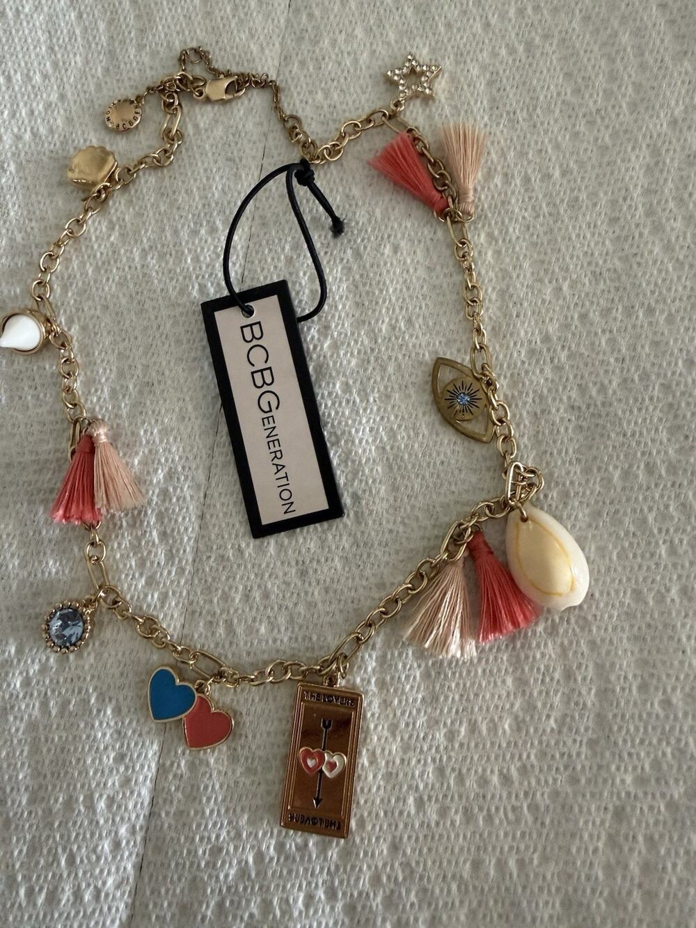 BCBG MAXAZRIA MULTI GOLD CHARM NECKLACE Evil Eye Star Shells